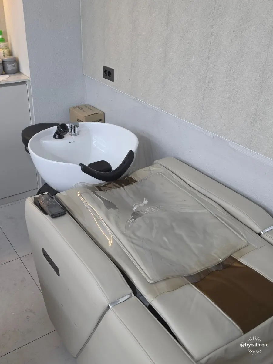 Massage chair set up in the shampoo room