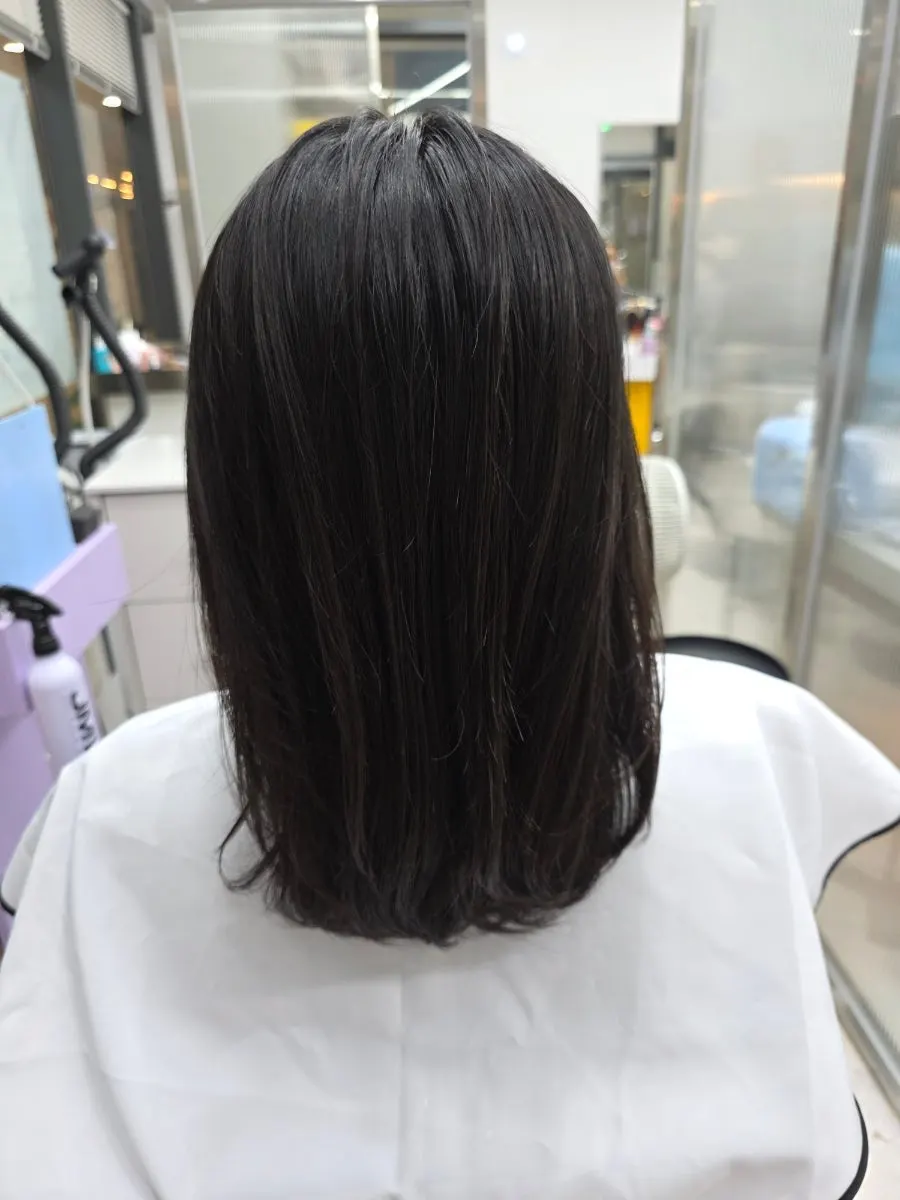Back view of calm, smooth hair