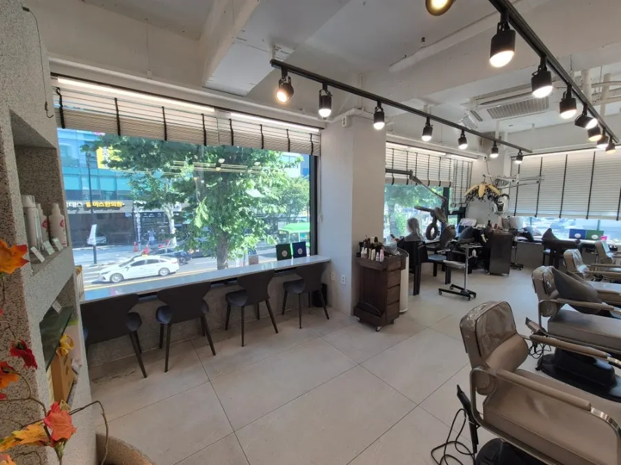 White-toned salon interior with natural light