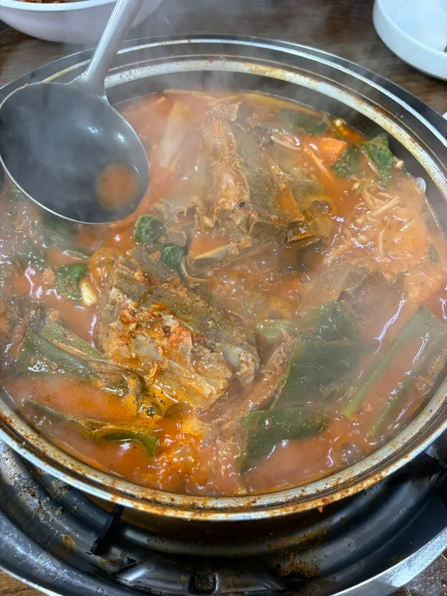 Spicy, richly flavored gamjatang broth