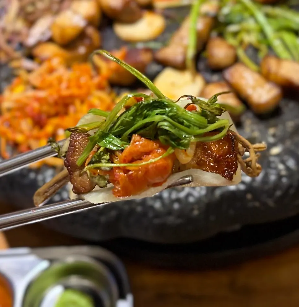 Close-up of pork belly on the grill