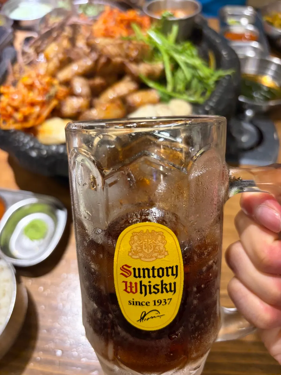 Pork belly ssam wrap served with a drink