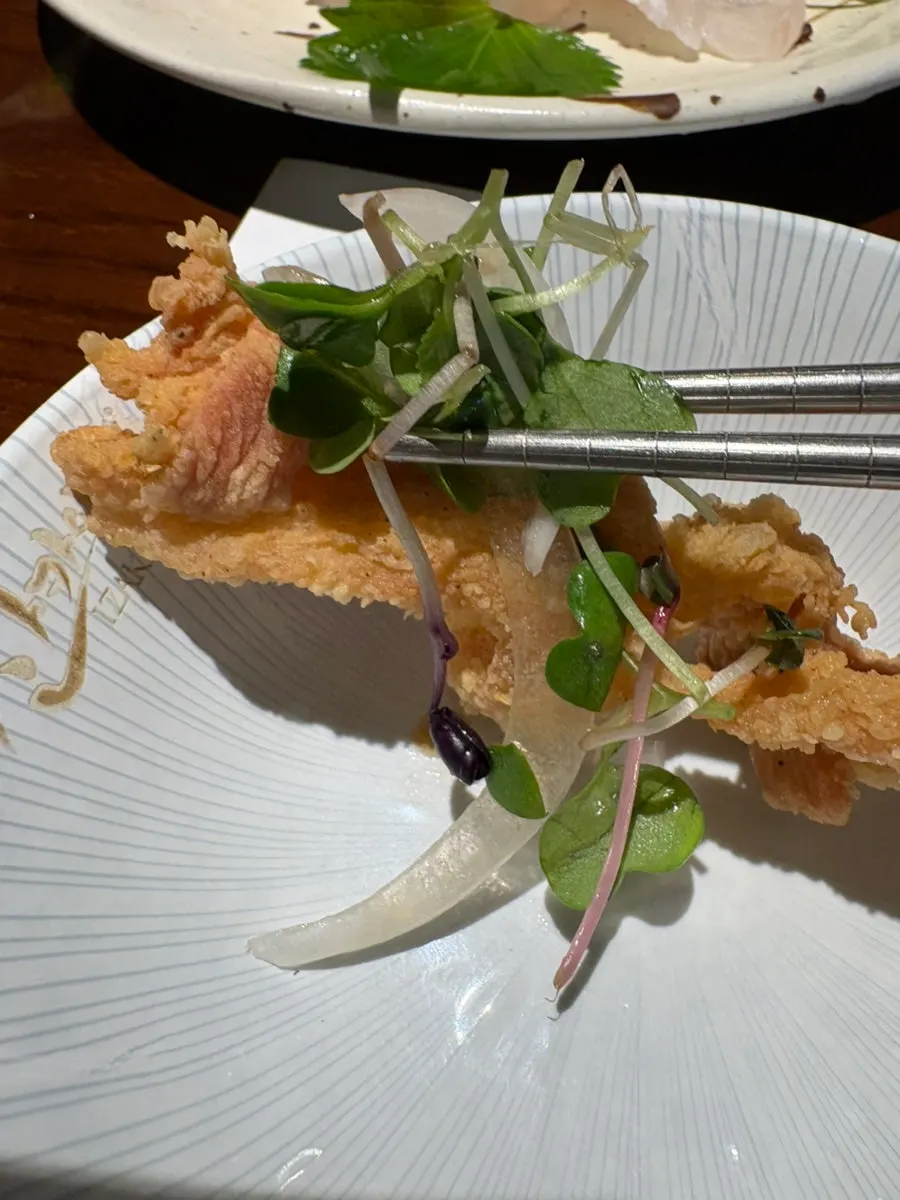 Halibut sashimi and yurinchi together on the drinking table