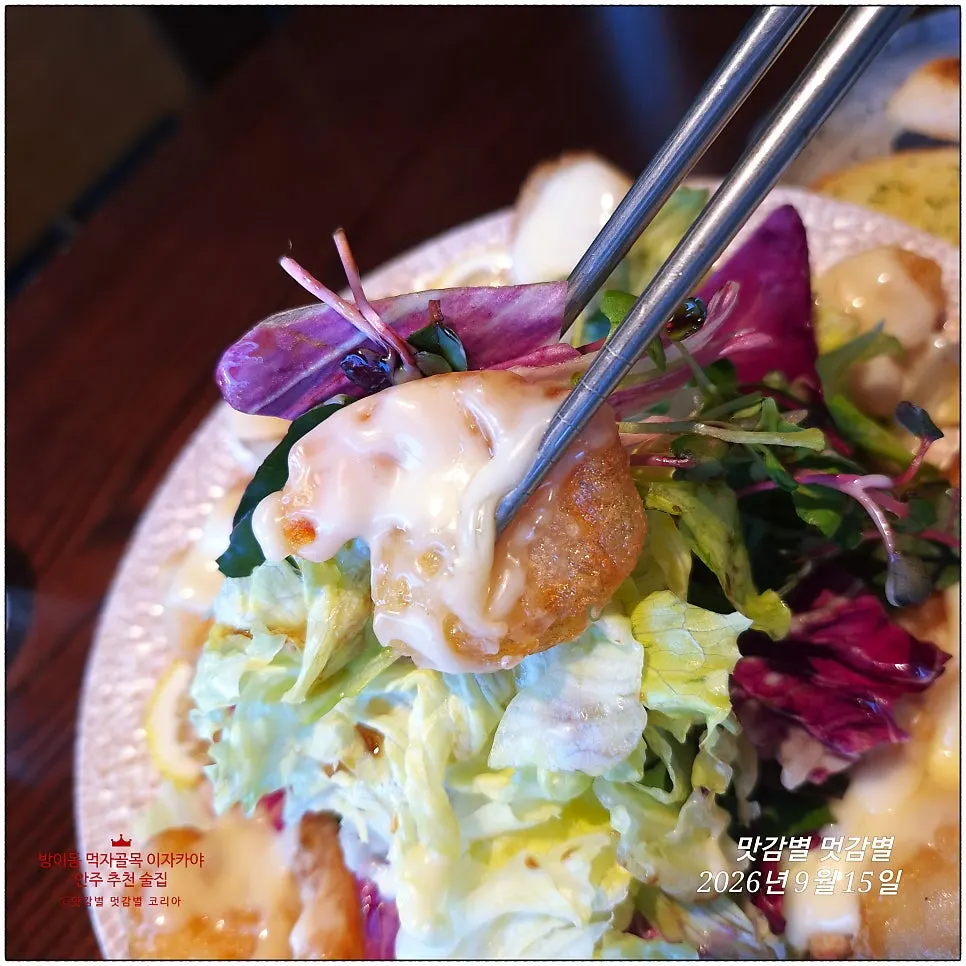 Plate of lemon cream shrimp generously topped with lemon cream sauce
