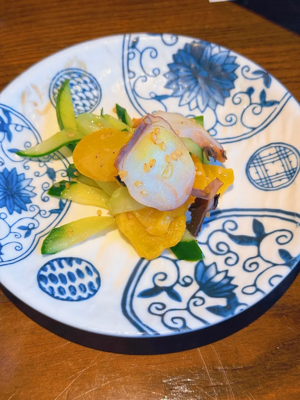 Basic side dish of cucumber, pickled radish and octopus