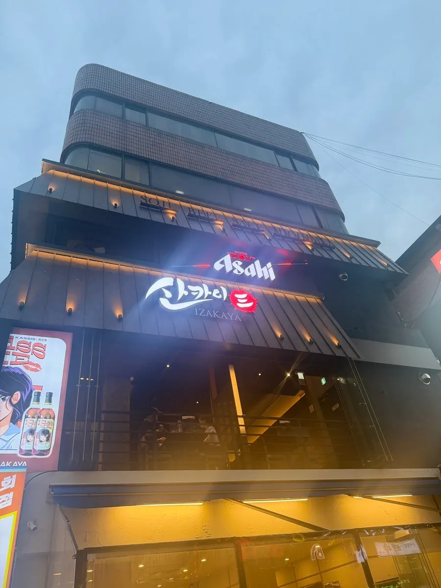Interior of Sangkai Izakaya Bangi Branch with open sightlines toward the windows