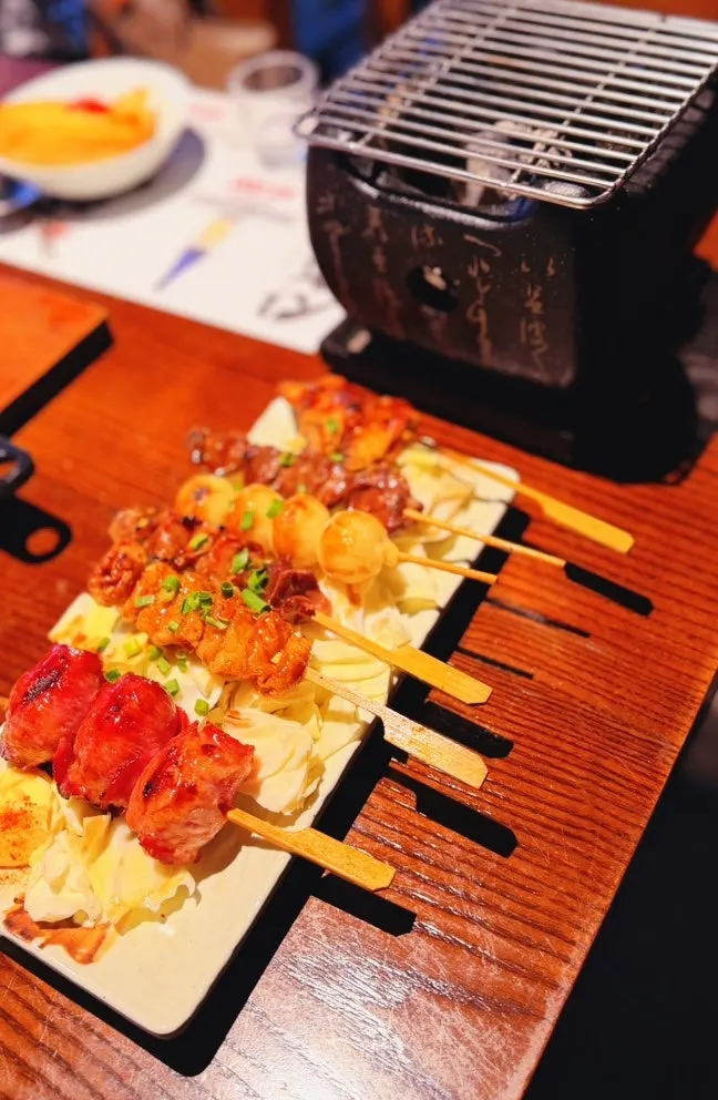 Assorted skewers served with a personal charcoal grill