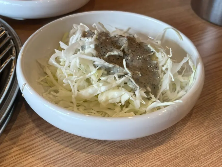 Basic side dishes and shredded scallions set on the table