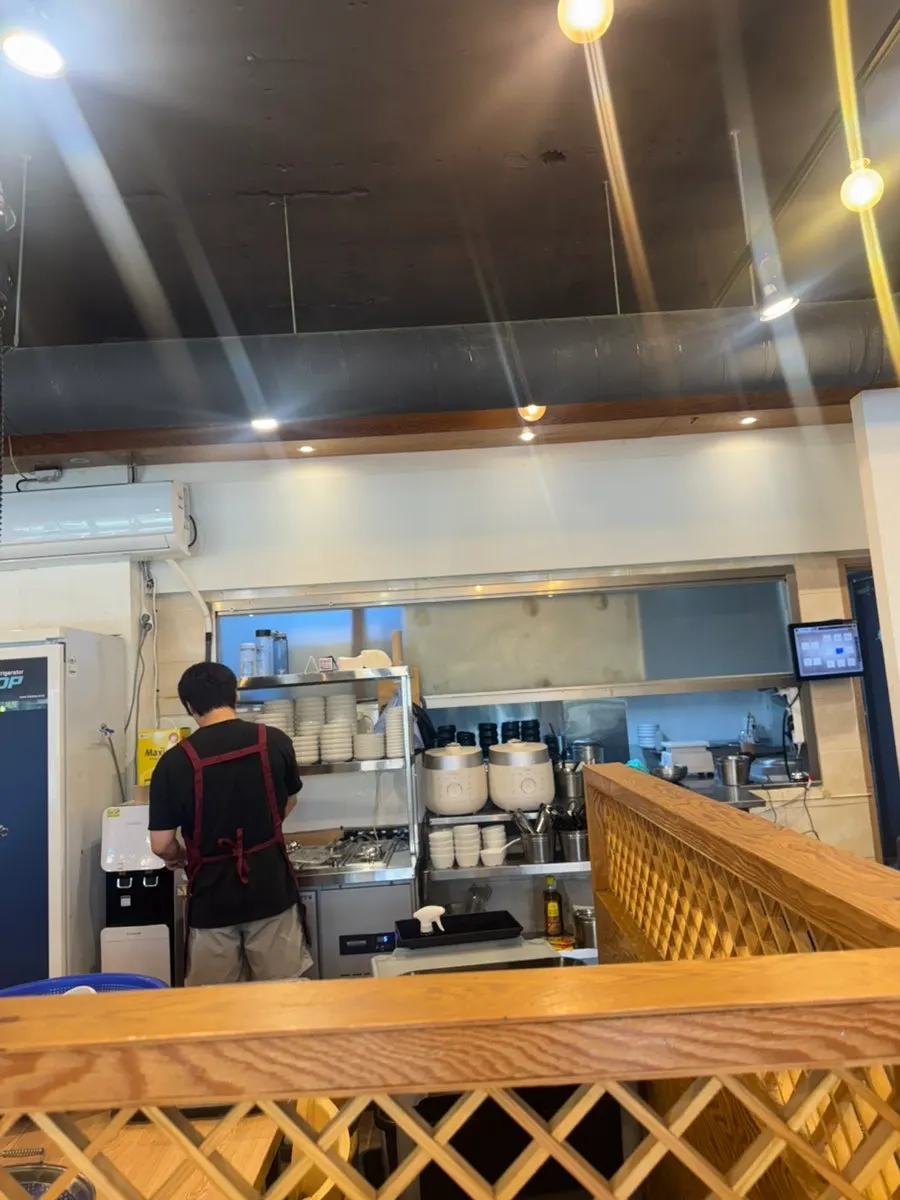 Open, spacious view of the grill restaurant's tables