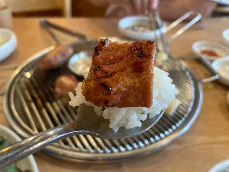 Fully grilled pork galbi with a glossy sheen