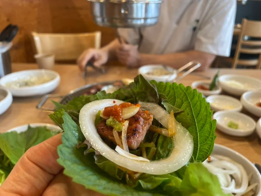 Charcoal-grilled marinated galbi enjoyed with lettuce wraps