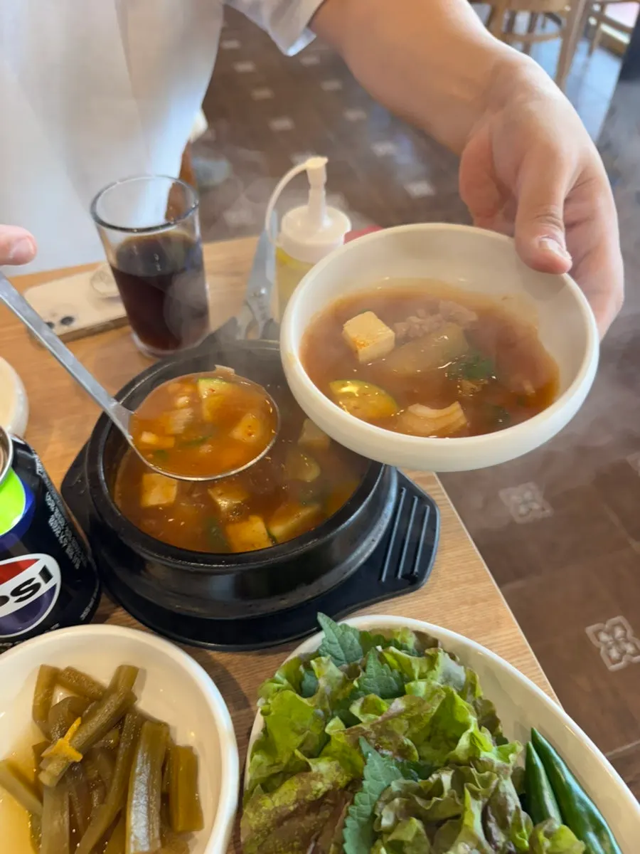 Doenjang jjigae served bubbling in a stone pot