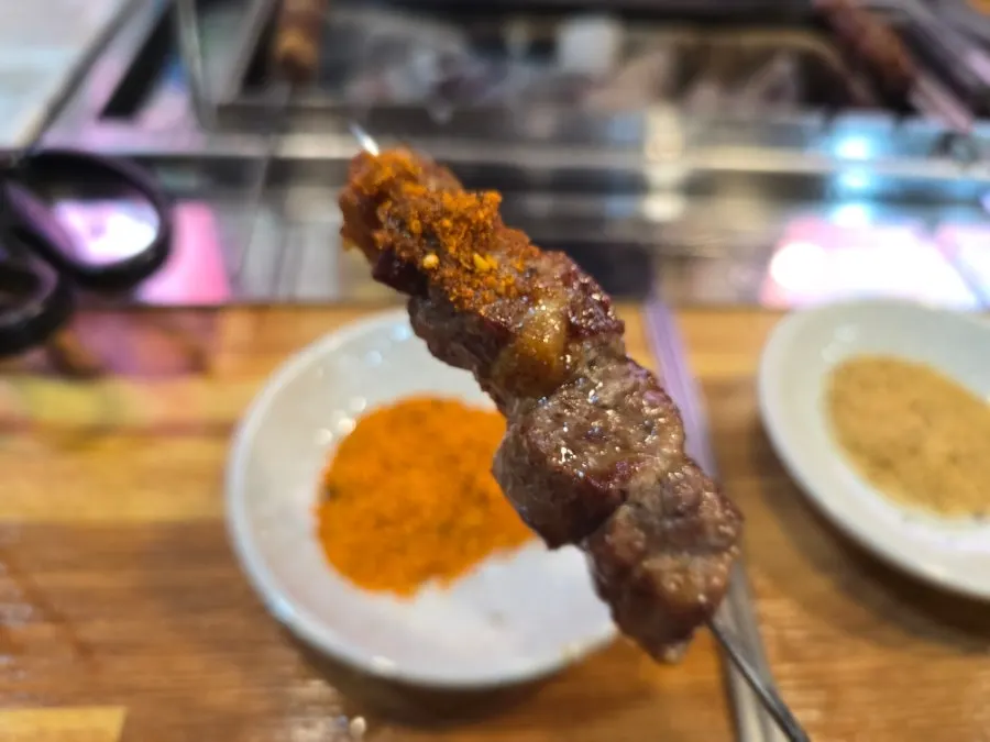 Seasoning plate served with the lamb skewers
