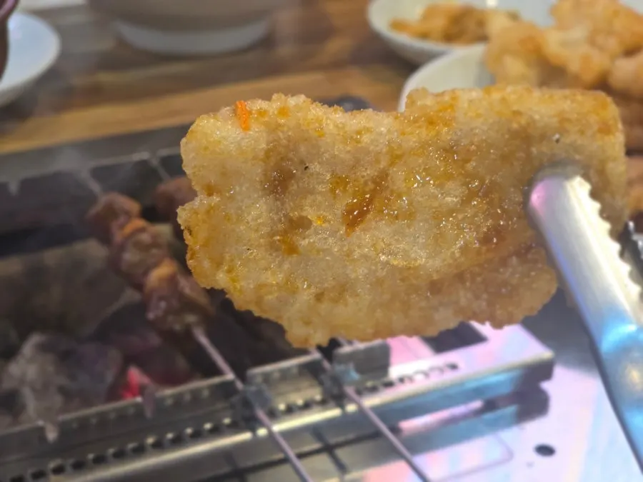 Plate of guobaorou coated in sauce
