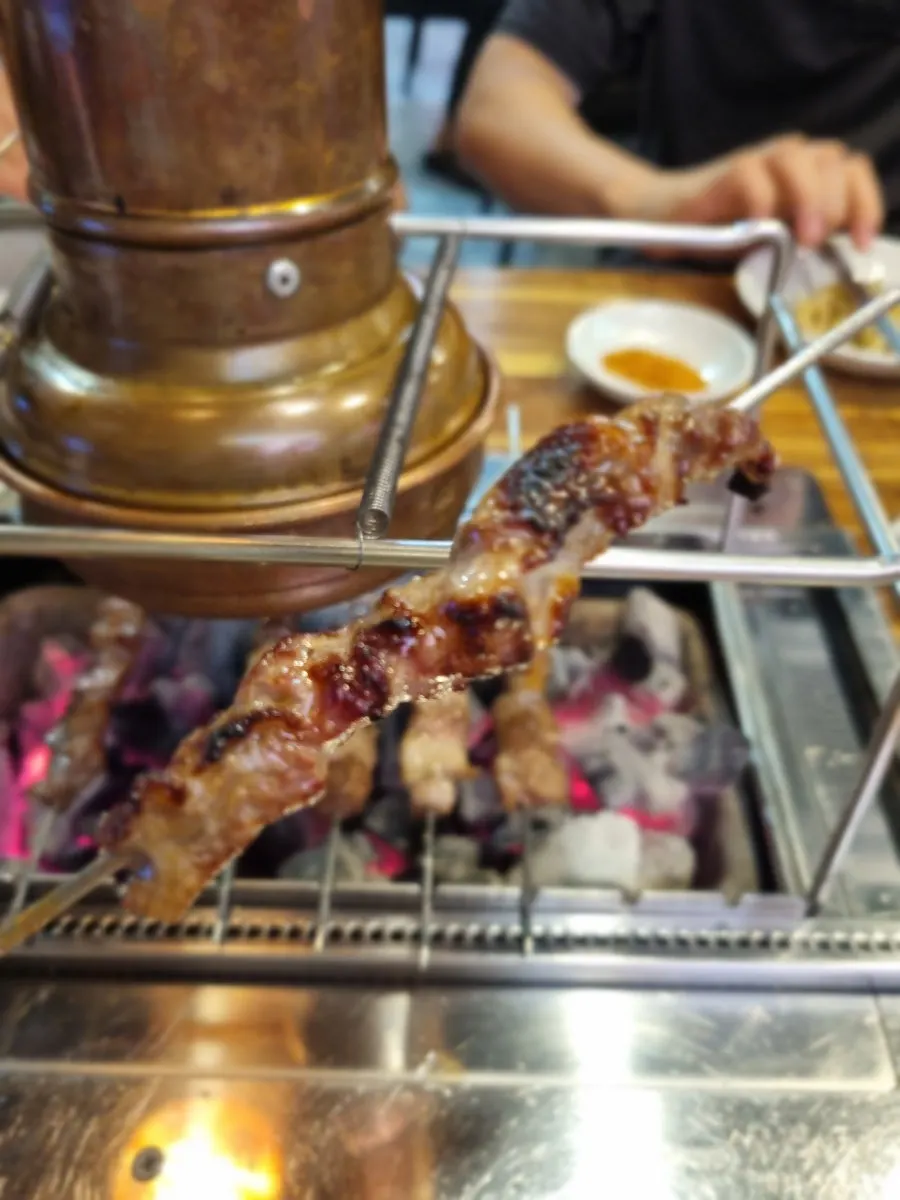 Close-up of golden-brown grilled yang kkochi