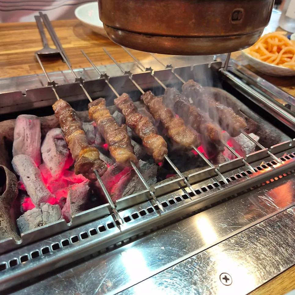 Lamb skewer dipped in cumin powder