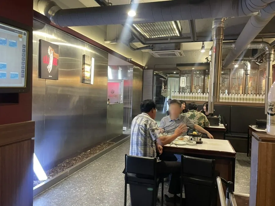 Private room and table seating at Sanseong Meat Shop
