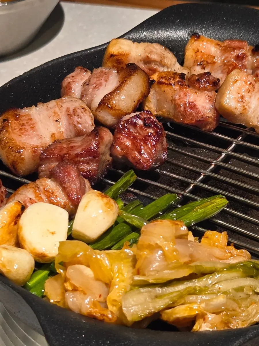 Grilled meat moved onto the side burner