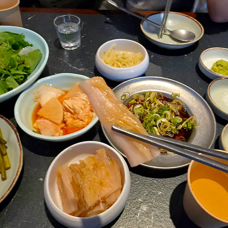 Banchan including seasoned vegetables and nabak kimchi