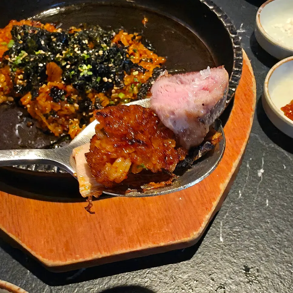 Table with meat and fried rice together