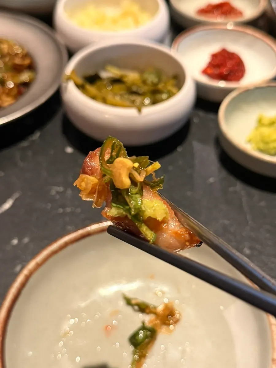 Picking up a piece of the mixed platter