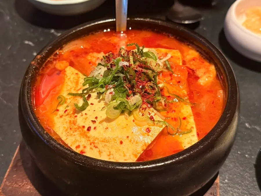 A pot of pork kimchi jjigae at Sansol Sinnonhyeon