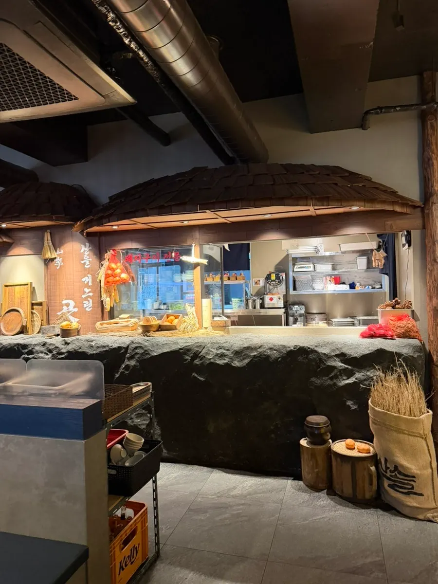Mountain-lodge-style interior mixing stone and wood