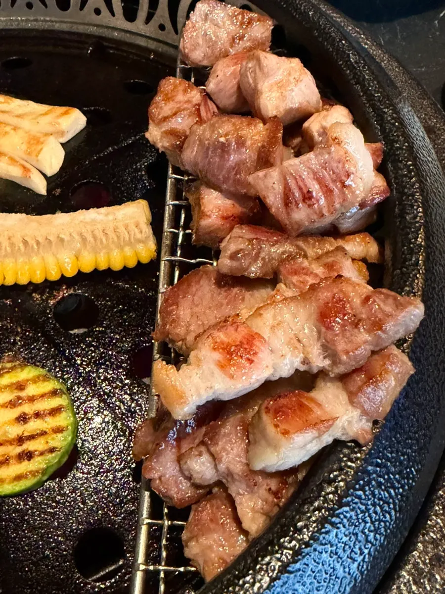 Close-up of perfectly cooked aged pork belly