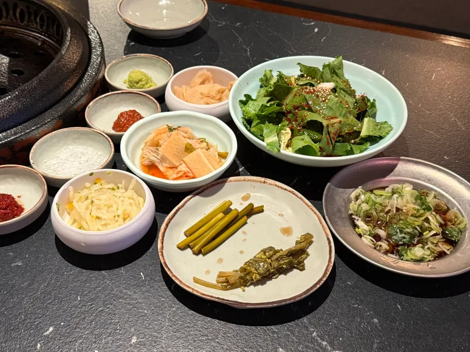 Neatly arranged basic banchan and sauces
