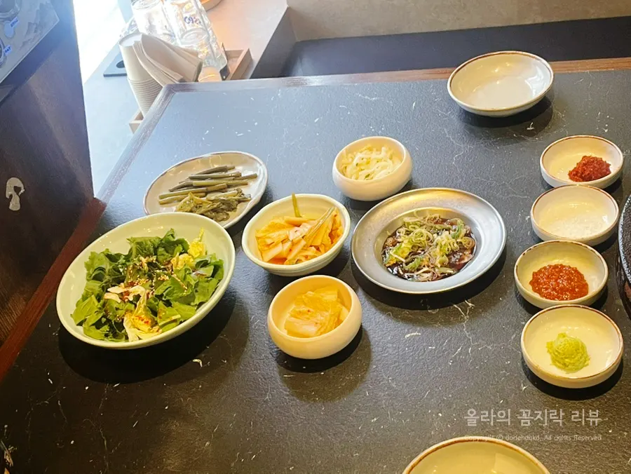 Sauce plates served alongside the meat