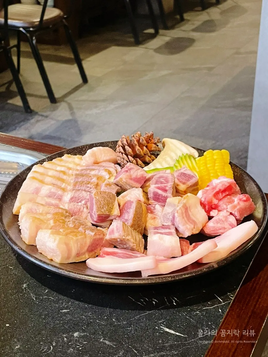 A piece of pork belly dipped in salt