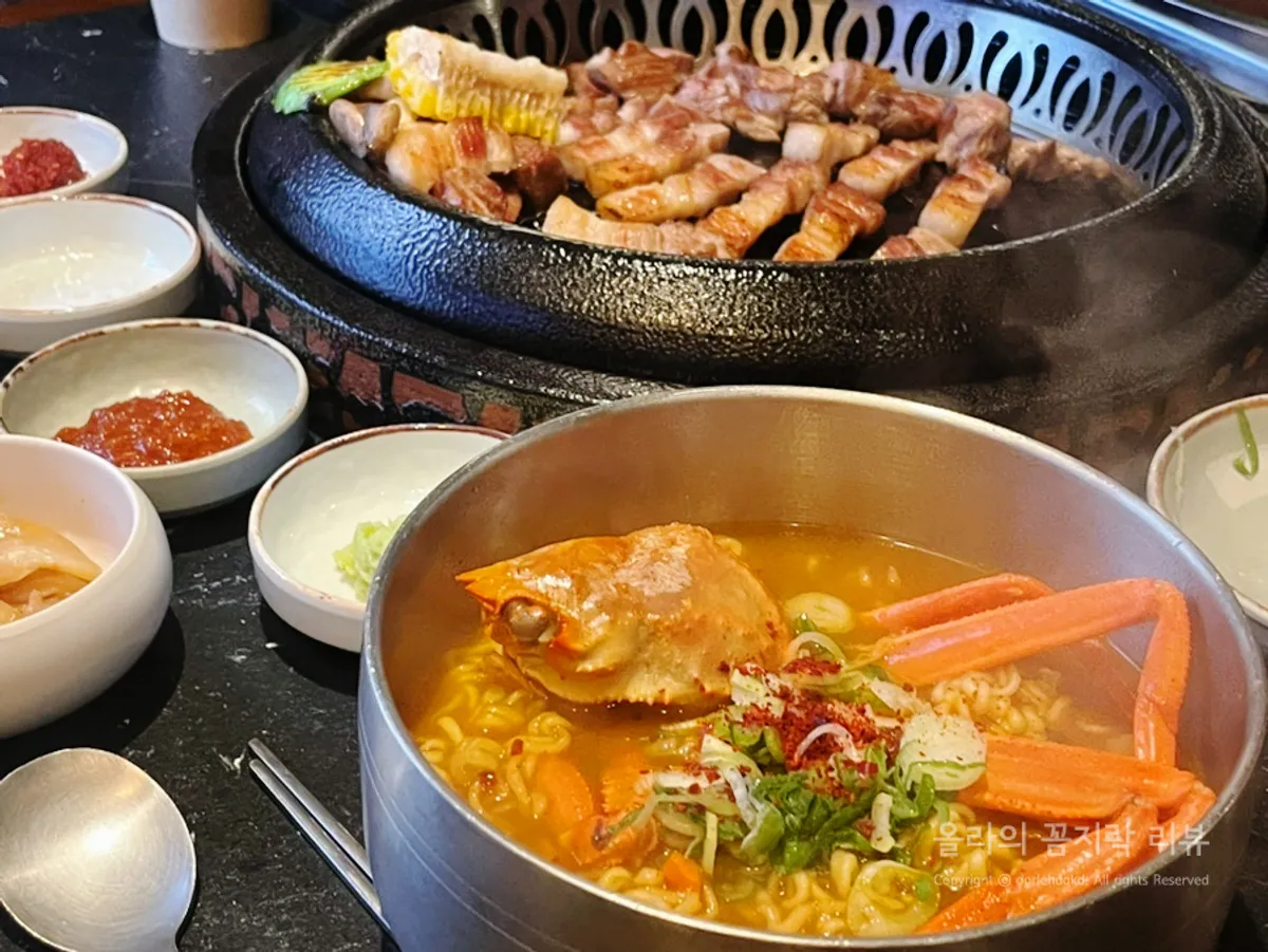 Table spread with pork belly mixed platter and hongge ramyeon at Sansol Sinnonhyeon