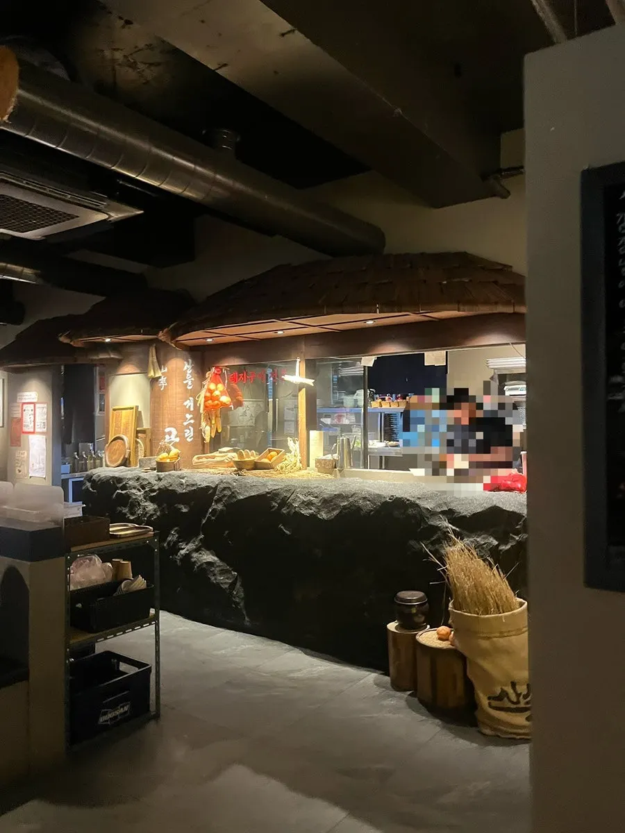 Cozy-lit dining hall of the BBQ restaurant