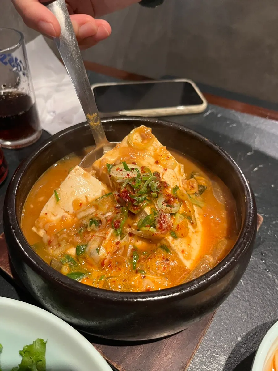 Doenjang jjigae with a big chunk of tofu