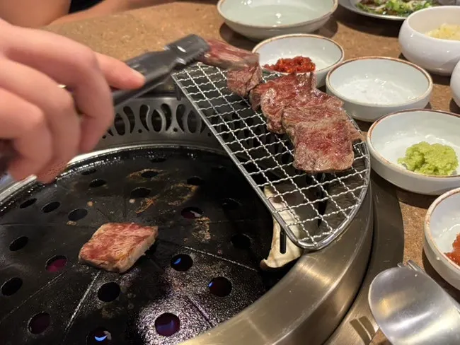 Staff grilling the jin flower short rib