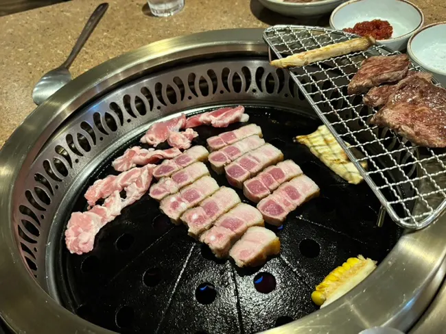 Close-up of golden, well-grilled aged pork belly