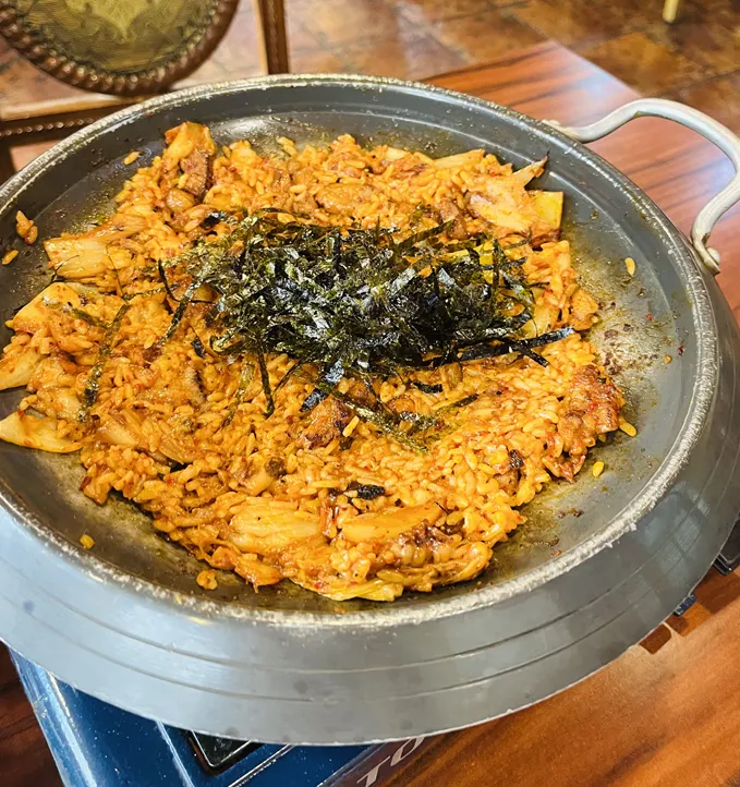 Pork kimchi grill perilla leaf wrap eaten in one bite