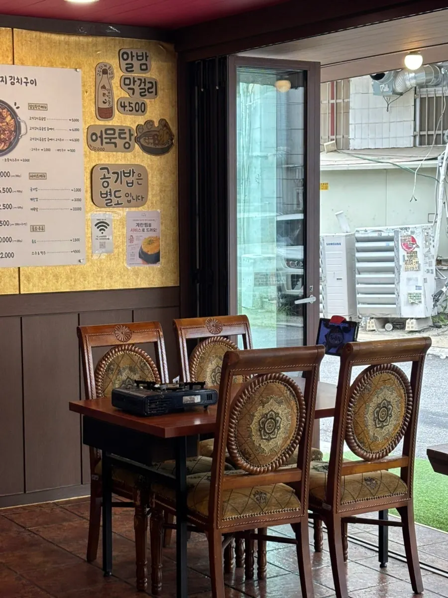 Dining hall seating with wide spacing between tables at Sarangjip
