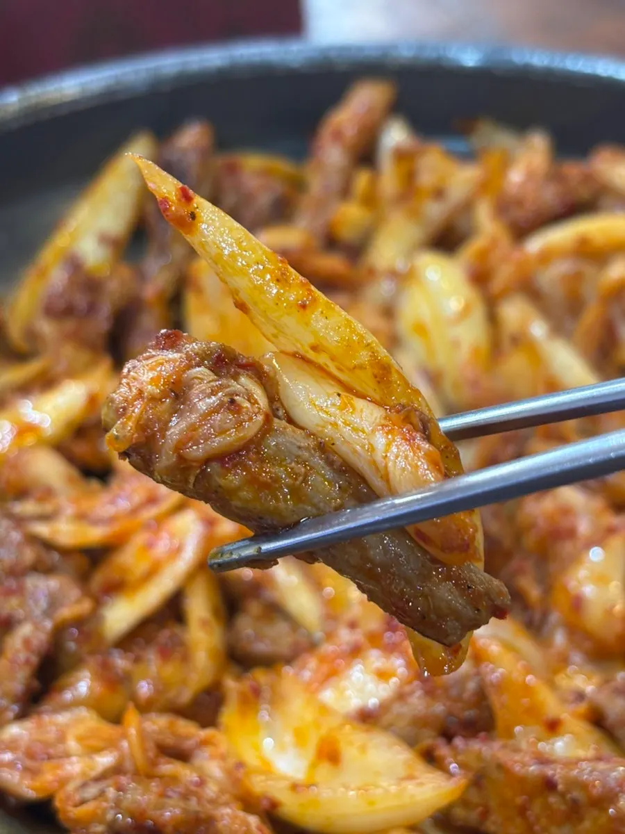 Pork kimchi grill served with kimchi and onion