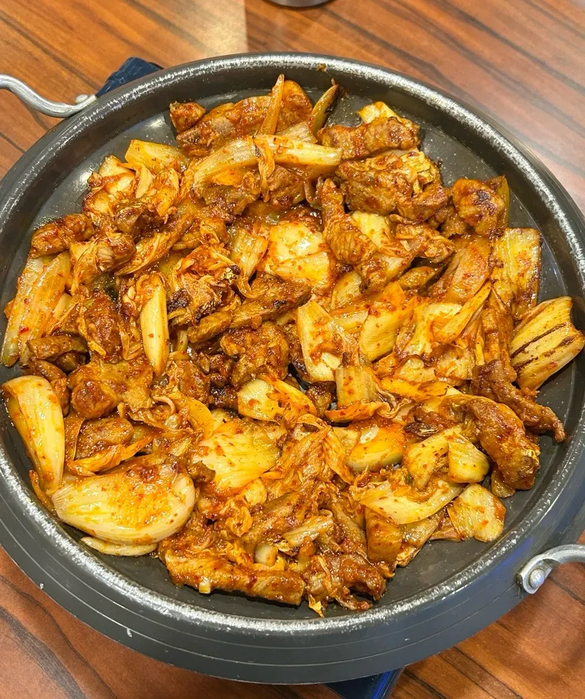 Wrap ingredients served with the pork kimchi grill