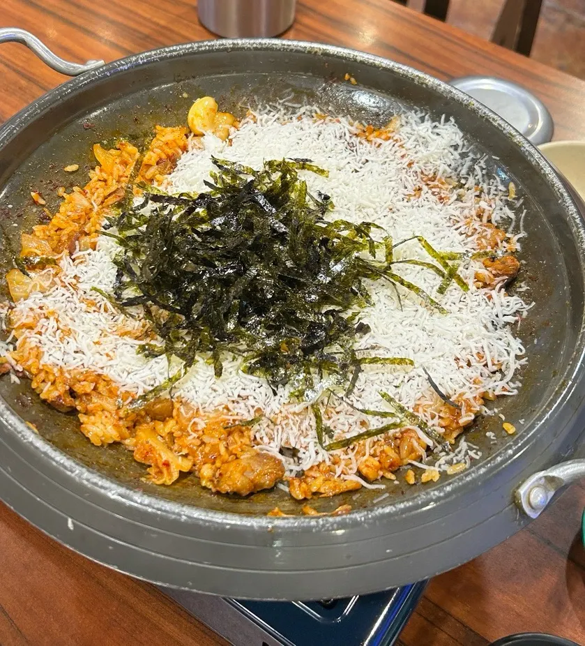 Fried rice being prepared on the hot plate