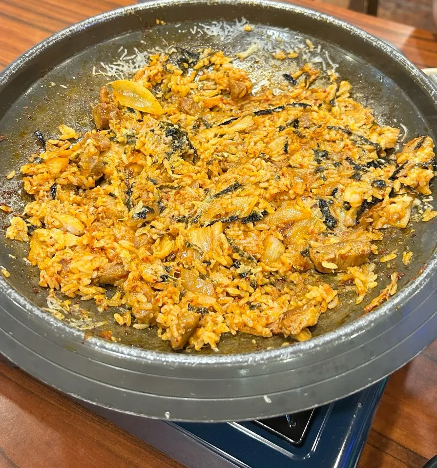 Spicy kimchi fried rice topped with cheese