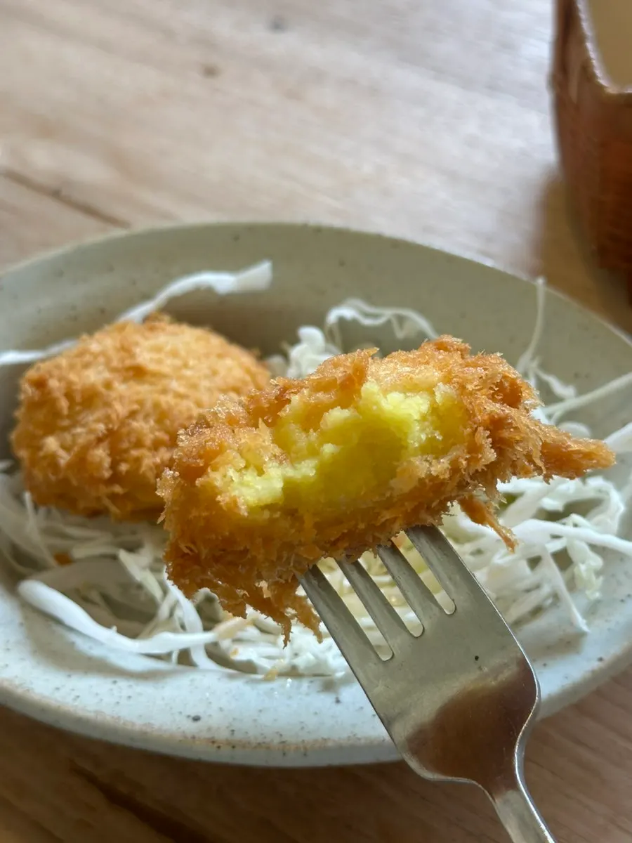 Freshly fried, piping hot sweet potato cheese croquette