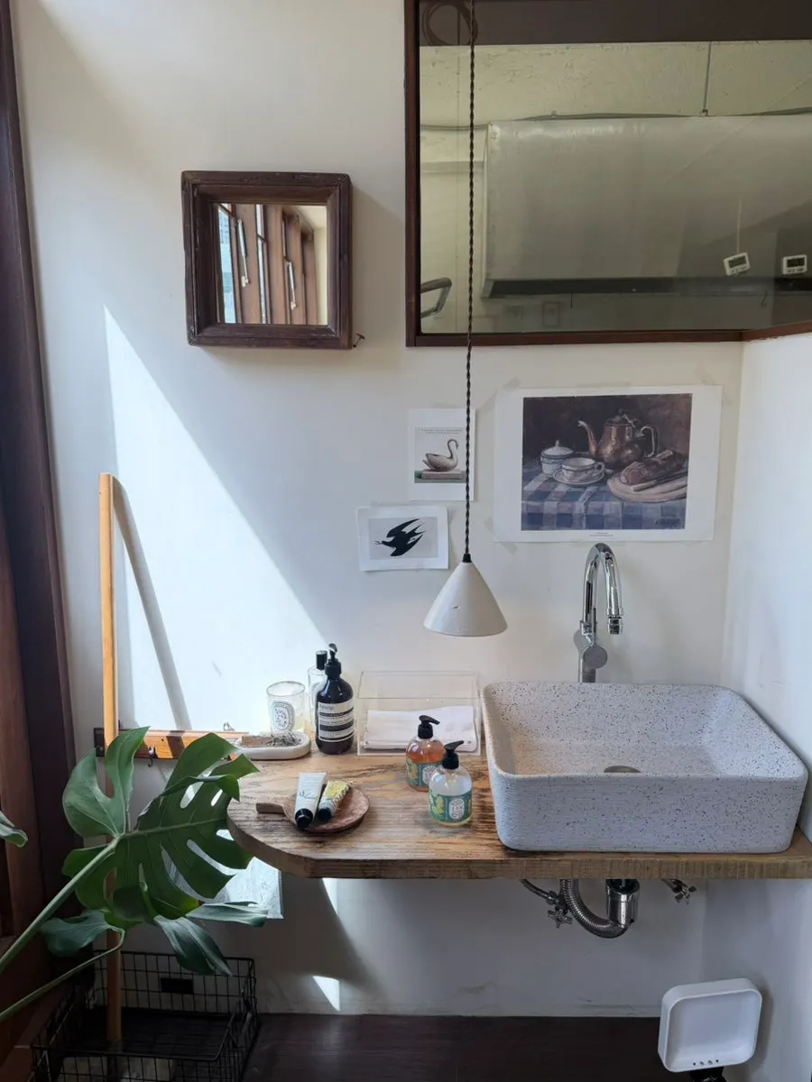 Hand-washing sink tucked inside the restaurant