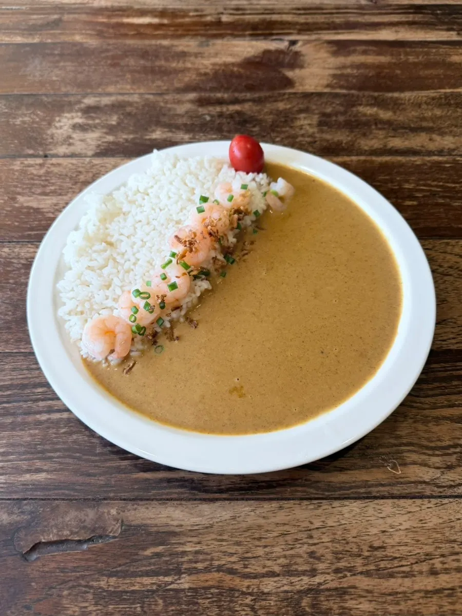 A plate of Sarugak20's shrimp cream curry