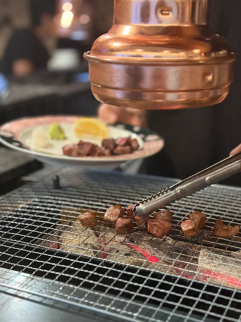 Korean beef tongue grilling over charcoal