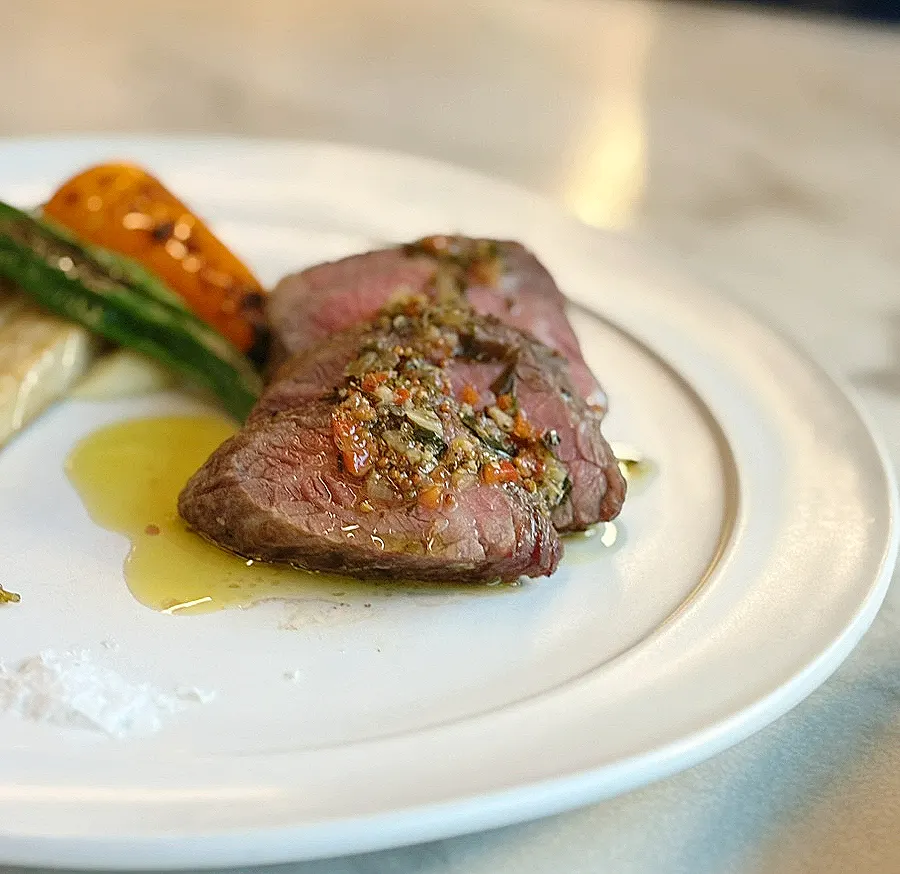 Sirloin cap steak plated with mashed potato