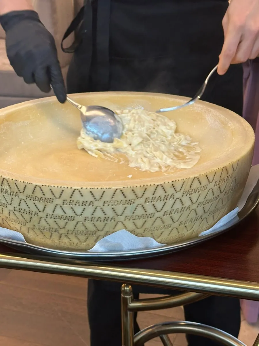 Fresh pasta topped with black truffle slices