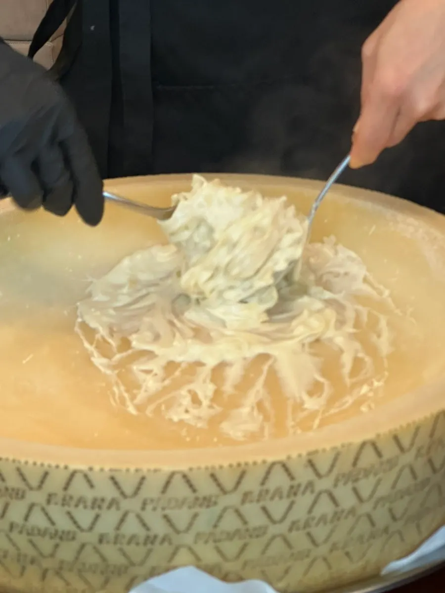 Close-up of the cheese wheel pasta