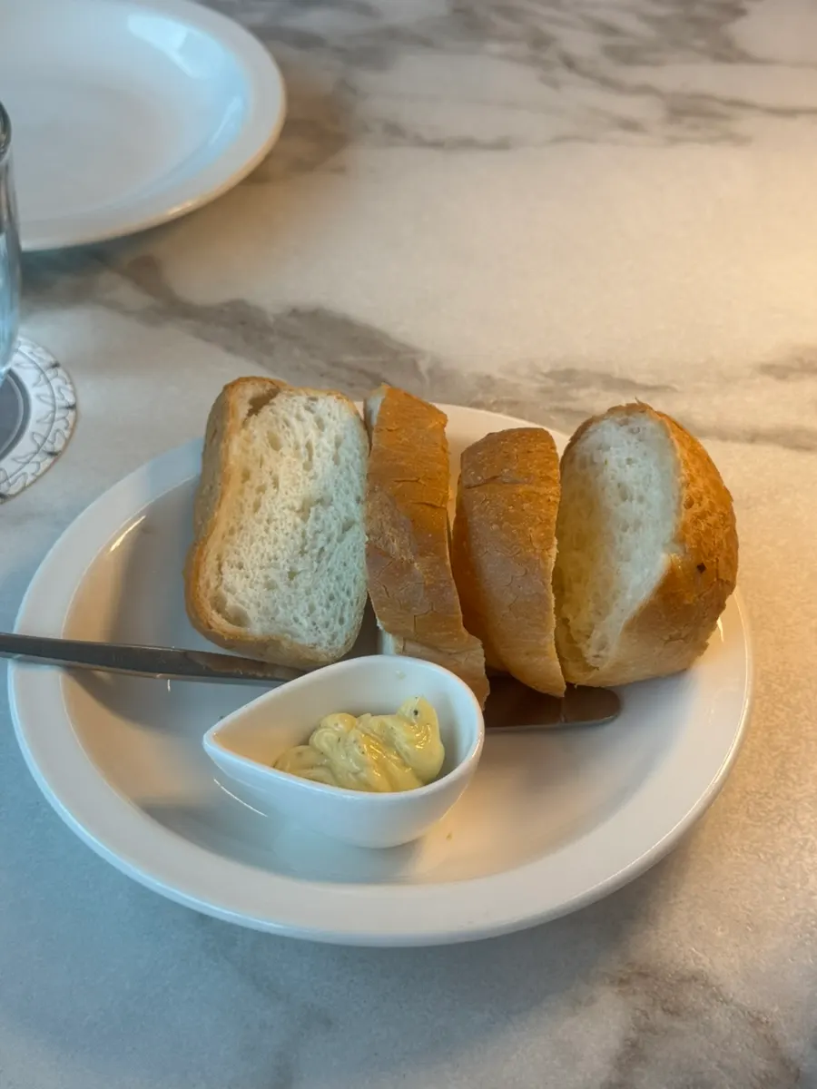 Pre-meal baguette bread served with butter